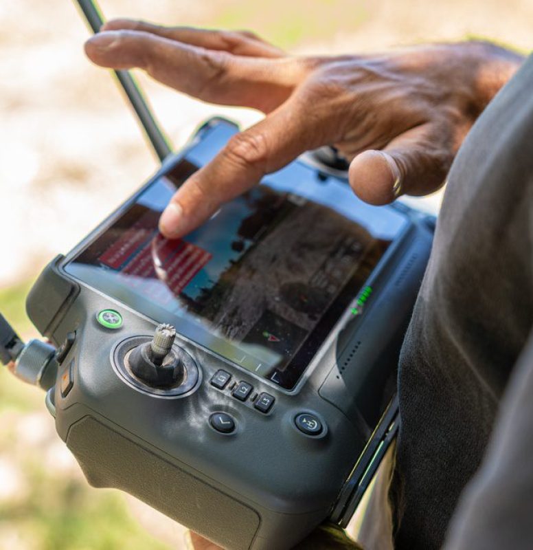 Farmer,Using,Drone,Remote,Controller,For,Precision,Agriculture.